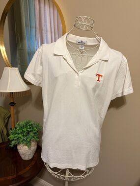 Antigua White Polo with Orange 'T' Logo